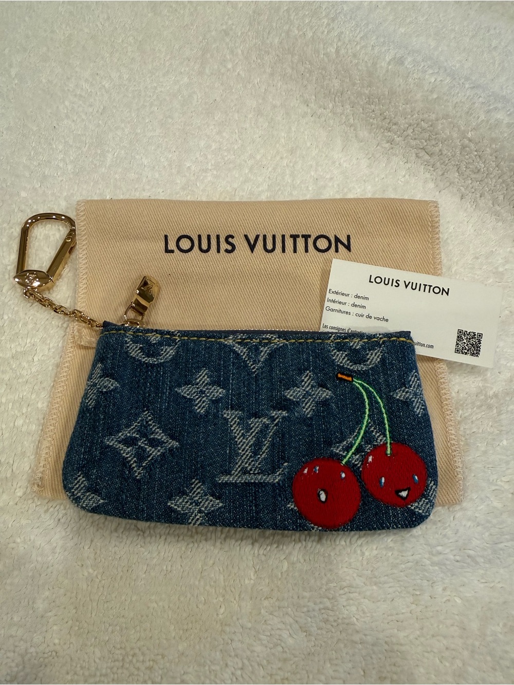 Louis Vuitton Denim Monogram Mini Pouch in Blue with Red Cherry Embroidery